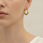 Load image into Gallery viewer, GER134. 14K Gold Twisted Hollow Hoop Earrings