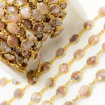 Load image into Gallery viewer, Coated Peach Moonstone Round Shape Bezel Gold Plated Wire Chain.