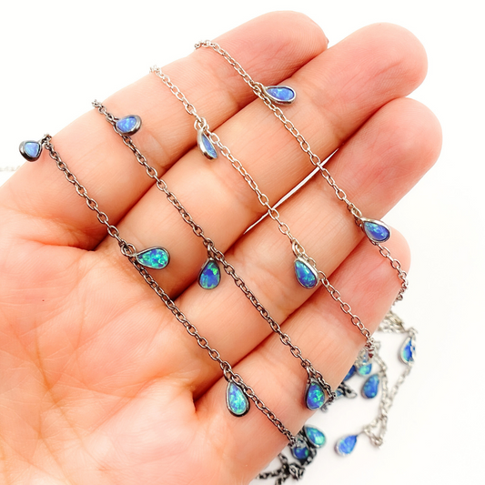 Created Blue Opal Tear Drop Shape Dangle Chain.