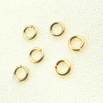 Load image into Gallery viewer, 14K Solid Yellow Gold Open Jump Ring 26ga 2.5mm. MFT040DE25-14K