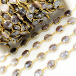 Load image into Gallery viewer, Coated Chocolate Moonstone Round Shape Bezel Gold Plated Wire Chain.