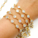 Load image into Gallery viewer, White Moonstone Round Shape Bezel Gold Plated Wire Chain.