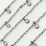 Load image into Gallery viewer, Coated Blue Quartz & CZ Dangle Oxidized Wire Chain.