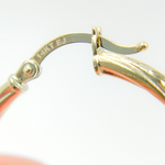 Load image into Gallery viewer, 14K Gold Hoop Earrings with Engraved Tornado Design.
