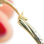 Load image into Gallery viewer, 14K Gold Hoop Earrings with Engraved Tornado Design.
