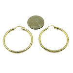 Load image into Gallery viewer, 14K Gold Hoop Earrings with Engraved Tornado Design.