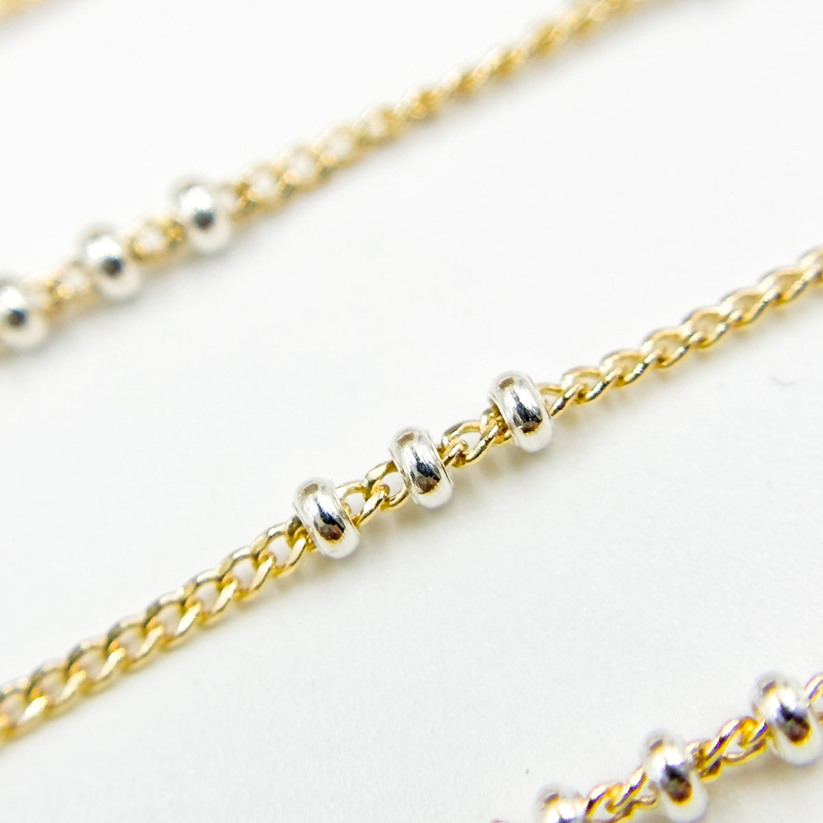 XM/S1327CF/29. 14k Gold Filled Curb Chain and 3 Sterling Silver Beads in Between