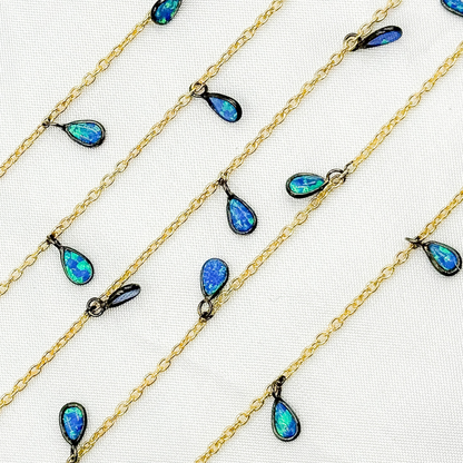 Created Blue Opal Tear Drop Shape Dangle Chain.