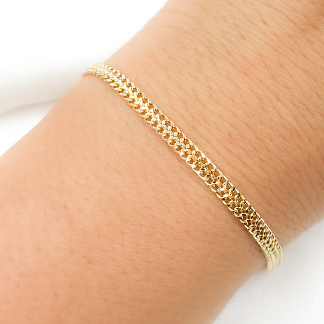 050HARWA1L136 Bracelet. 14K Solid Gold Flat Curb Bracelet