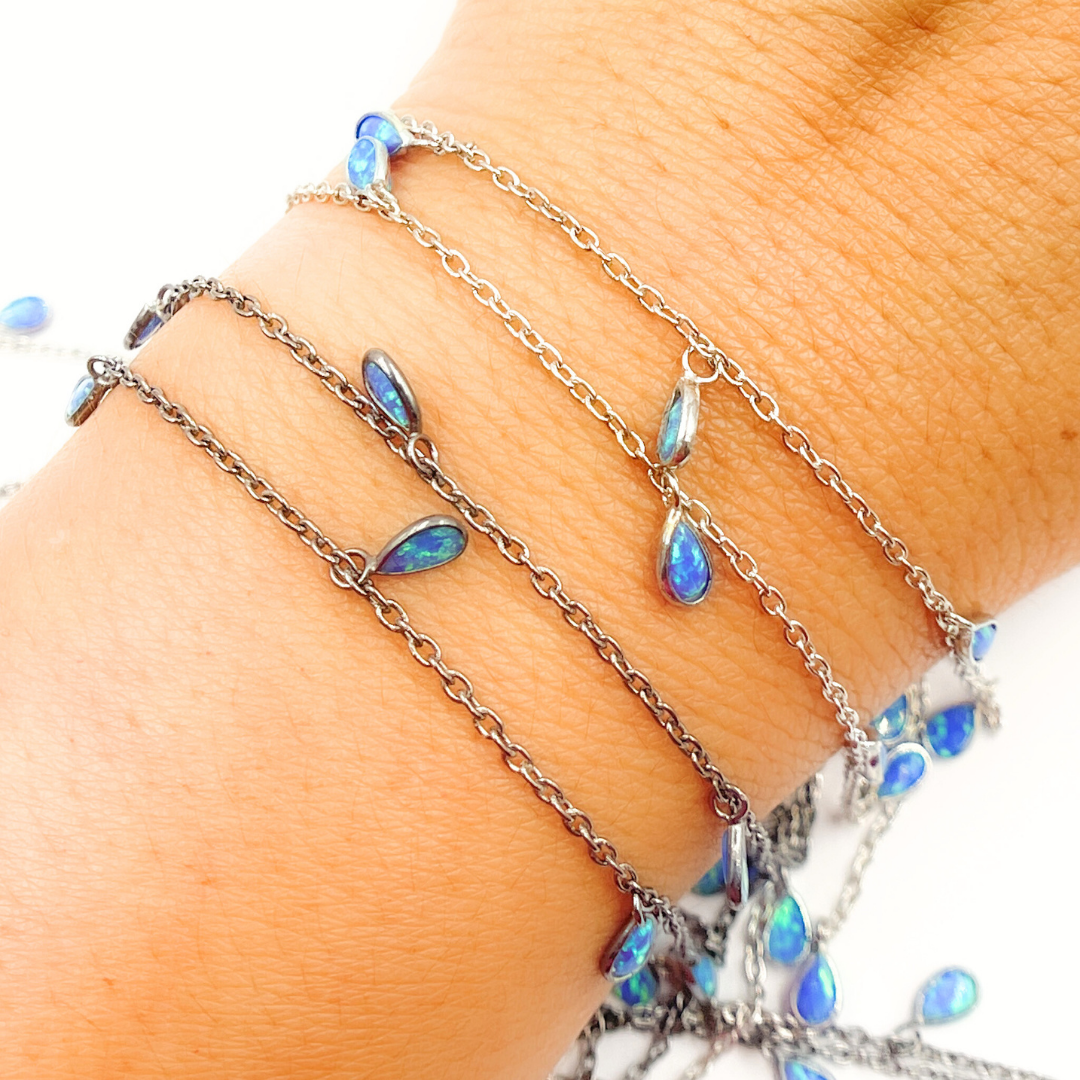 Created Blue Opal Tear Drop Shape Dangle Chain.