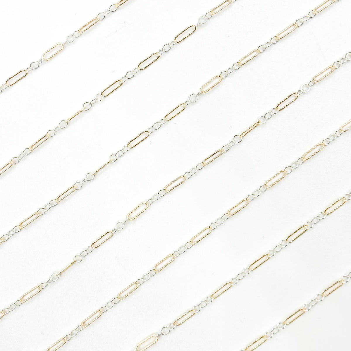 XM/1003K/SP. 14K Gold Filled and Sterling Silver Knurled Link Chain