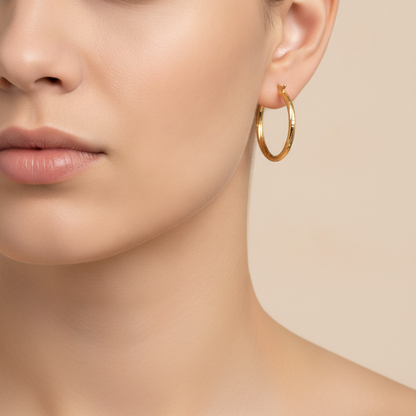 GER173. 14K Gold Hollow Hoop Earrings with Engraved Tornado Design