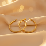 Load image into Gallery viewer, GER67. 14K Gold Hollow Hoop Earrings with Engraved Tornado Design