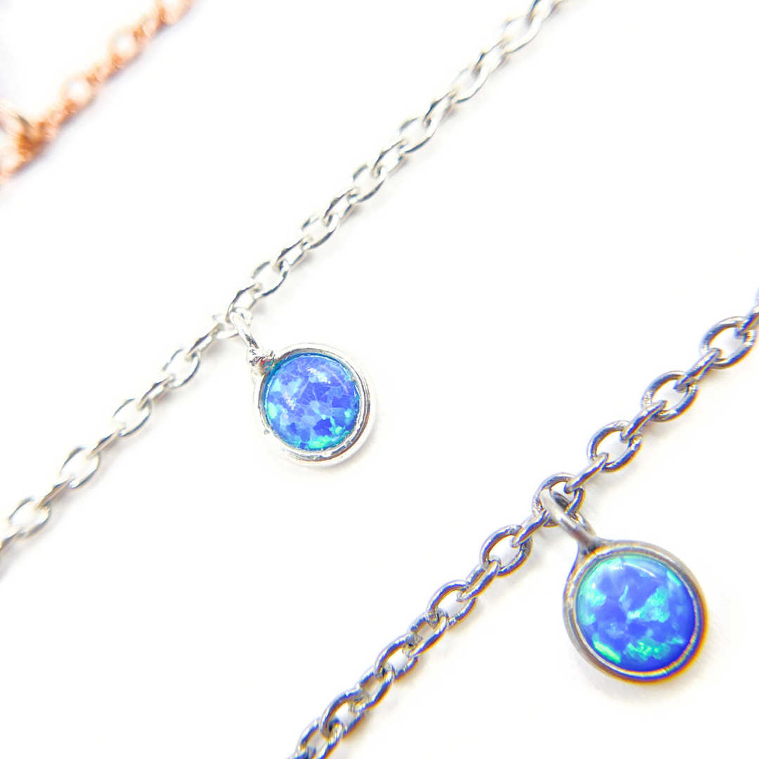 Created Blue Opal Round Shape Dangle Chain.