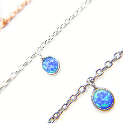 Created Blue Opal Round Shape Dangle Chain.