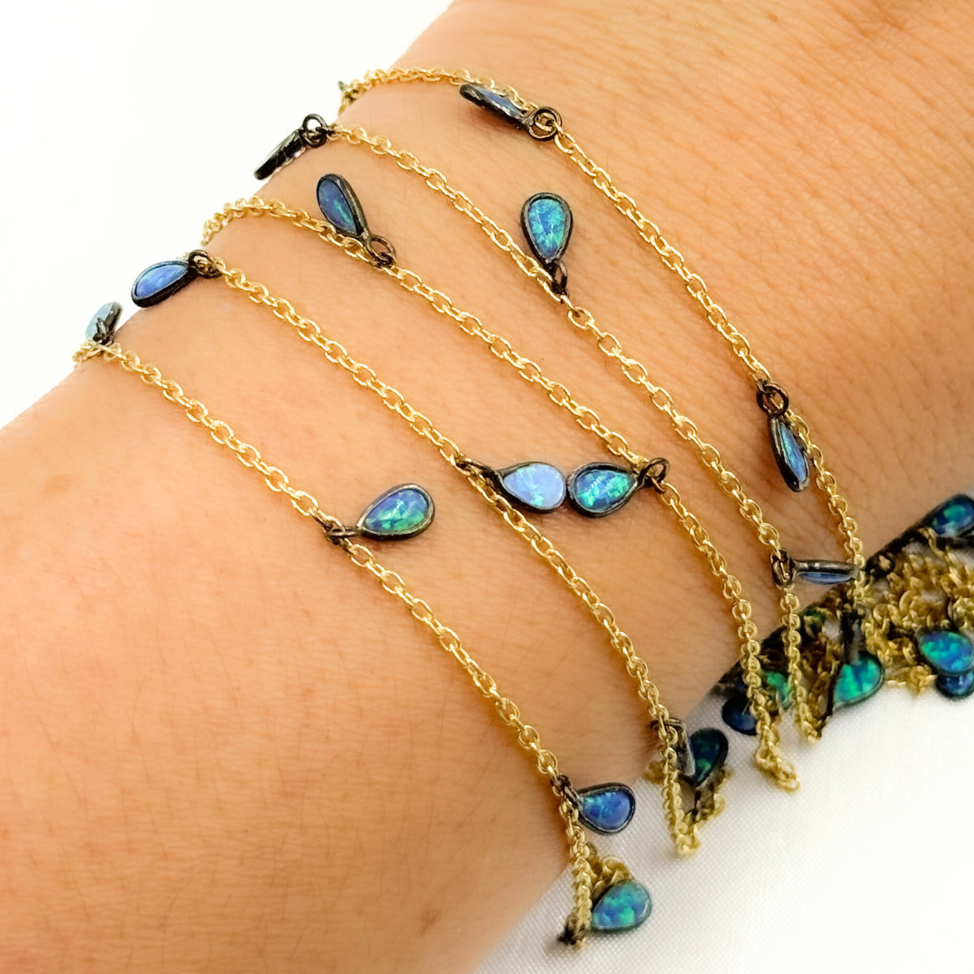 Created Blue Opal Tear Drop Shape Dangle Chain.