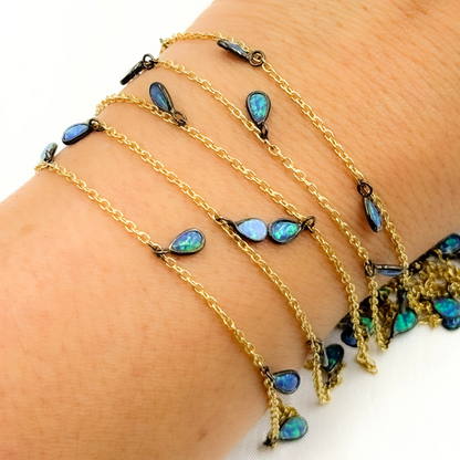 Created Blue Opal Tear Drop Shape Dangle Chain.