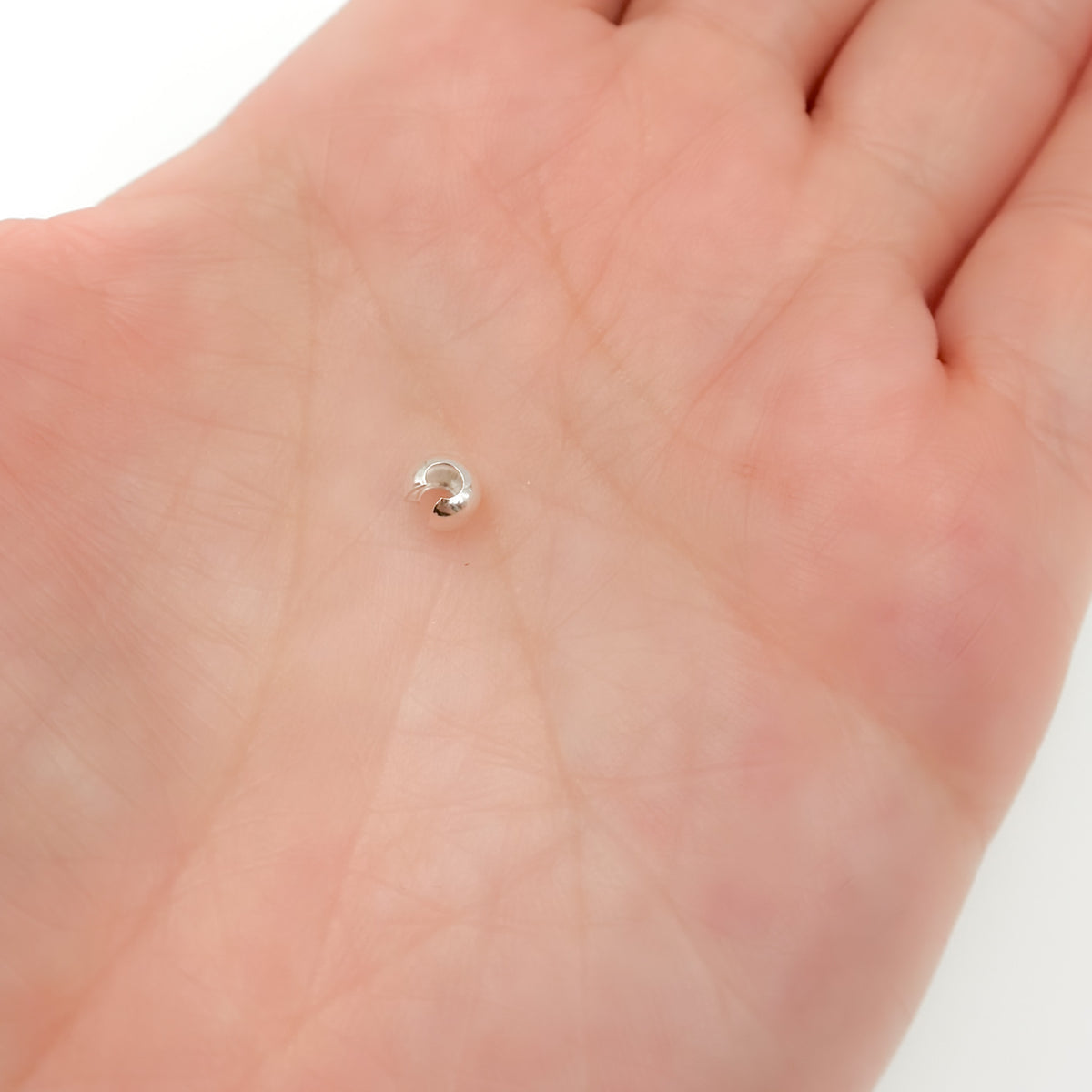5004840CC. White Sterling Silver Crimp Cover. Size: 4mm. Sold by Package of 50 or 100 Pcs.