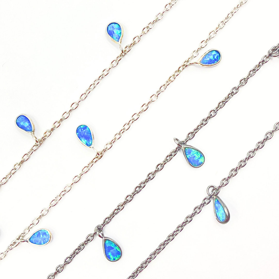 Created Blue Opal Tear Drop Shape Dangle Chain.