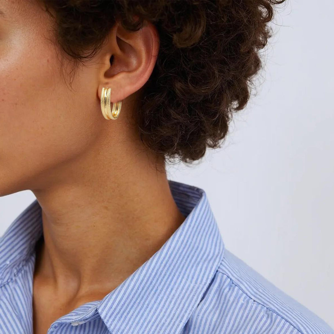 15850025517. 14K Solid Gold Smooth and Textured Oval Hollow Hoop Earrings