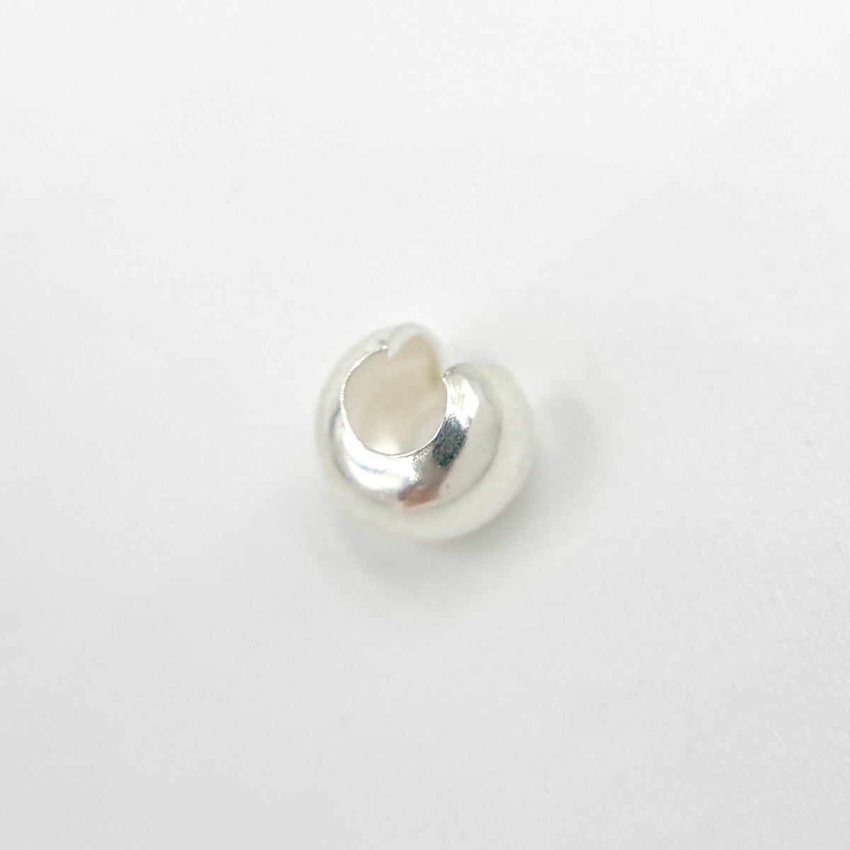 5004840CC. White Sterling Silver Crimp Cover. Size: 4mm. Sold by Package of 50 or 100 Pcs.