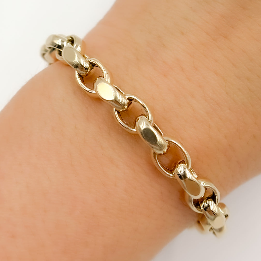 568/A140B. 14K Solid Gold Hollow Flat Cable Link Bracelet