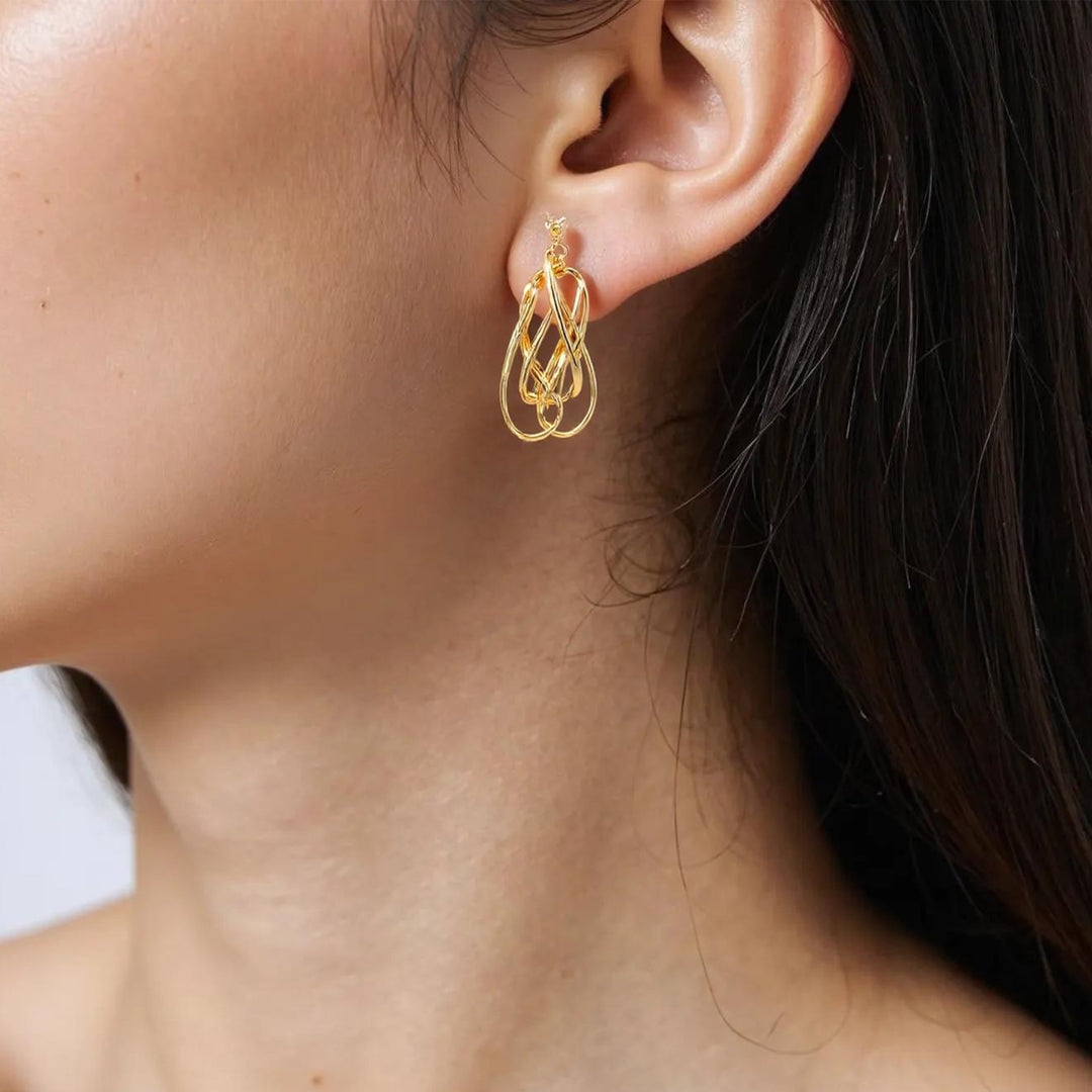 15850023044. 14K Solid Gold Twist Triple Oval Hollow Dangle Earrings