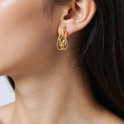 15850023044. 14K Solid Gold Twist Triple Oval Hollow Dangle Earrings