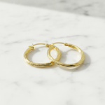 Load image into Gallery viewer, GER69. 14K Gold Hollow Hoop Earrings with Engraved Tornado Design