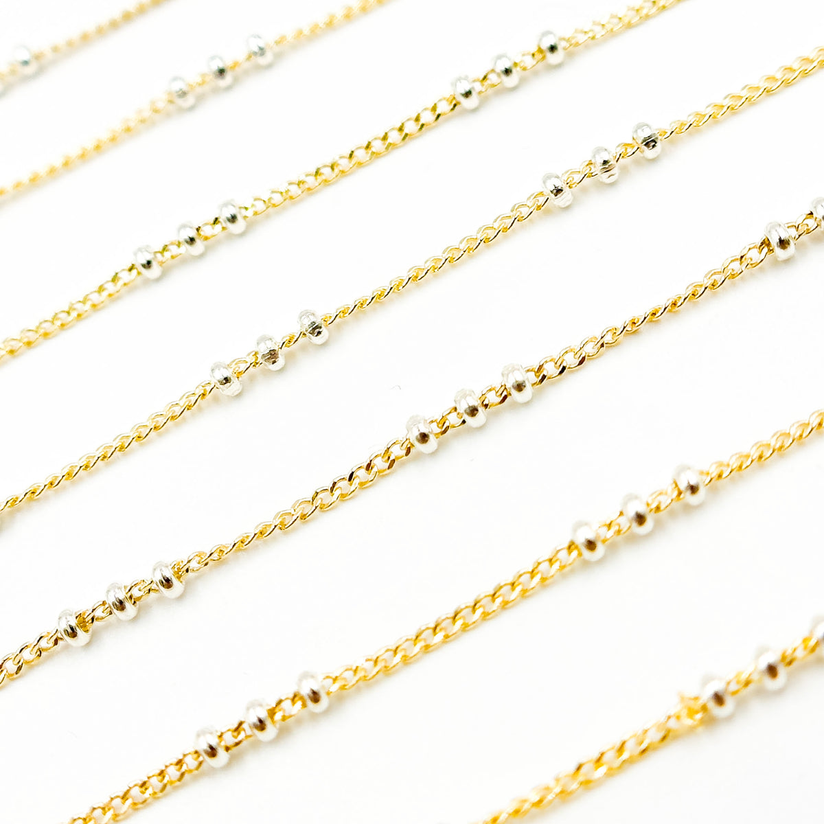 XM/S1327CF/29. 14k Gold Filled Curb Chain and 3 Sterling Silver Beads in Between