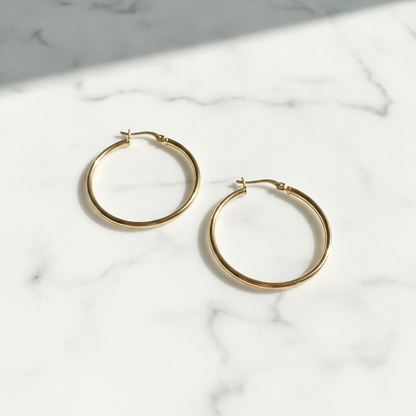 GER169. 14K Gold Hollow Hoop Earrings