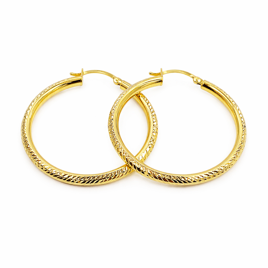 GER67. 14K Gold Hollow Hoop Earrings with Engraved Tornado Design