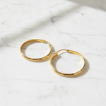 Load image into Gallery viewer, GER76. 14K Gold Diamond Cut Hollow Hoop Earrings