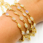 Load image into Gallery viewer, ETH11. Ethiopian Opal Oval Shape Bezel Gold Plated Wire Chain