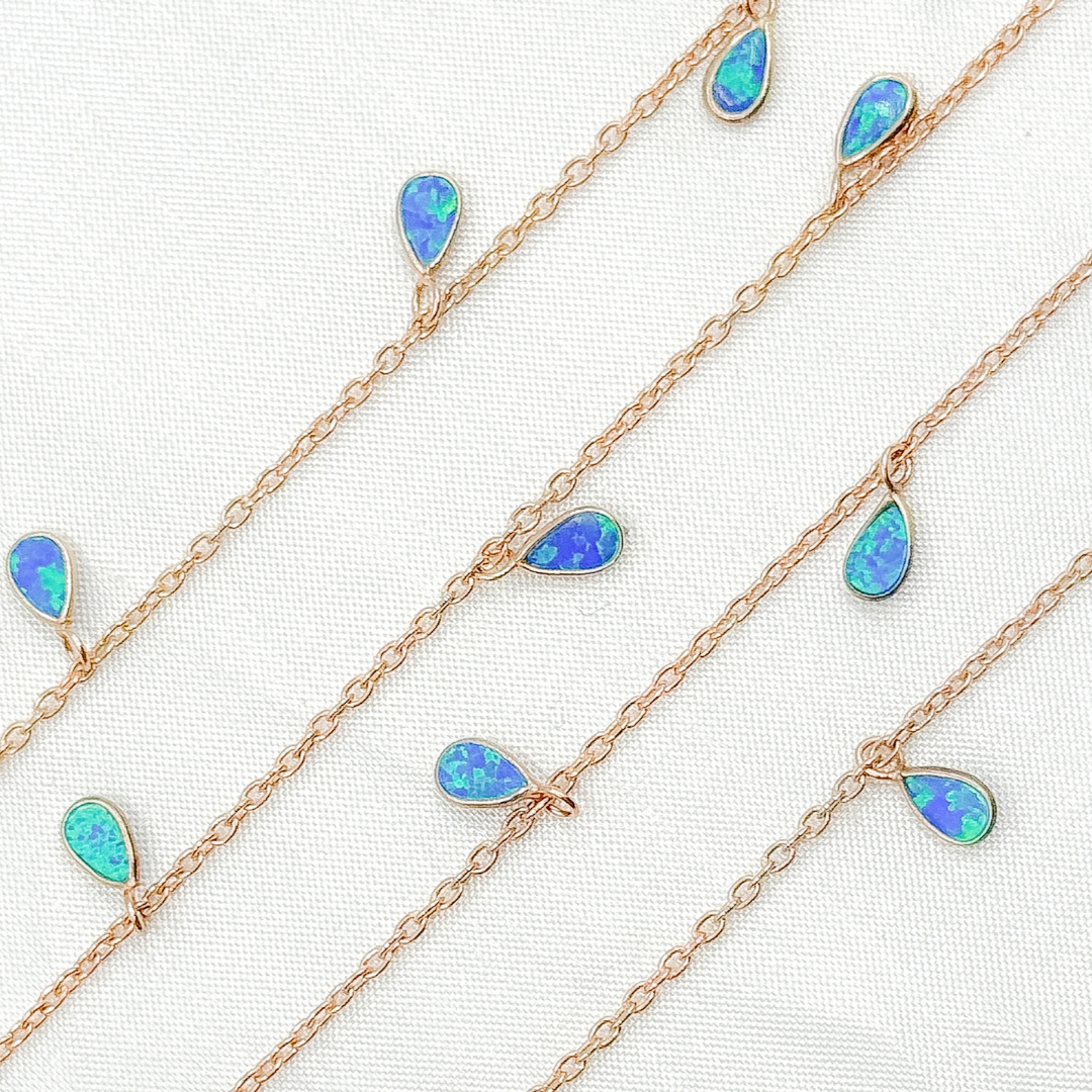 Created Blue Opal Tear Drop Shape Dangle Chain.