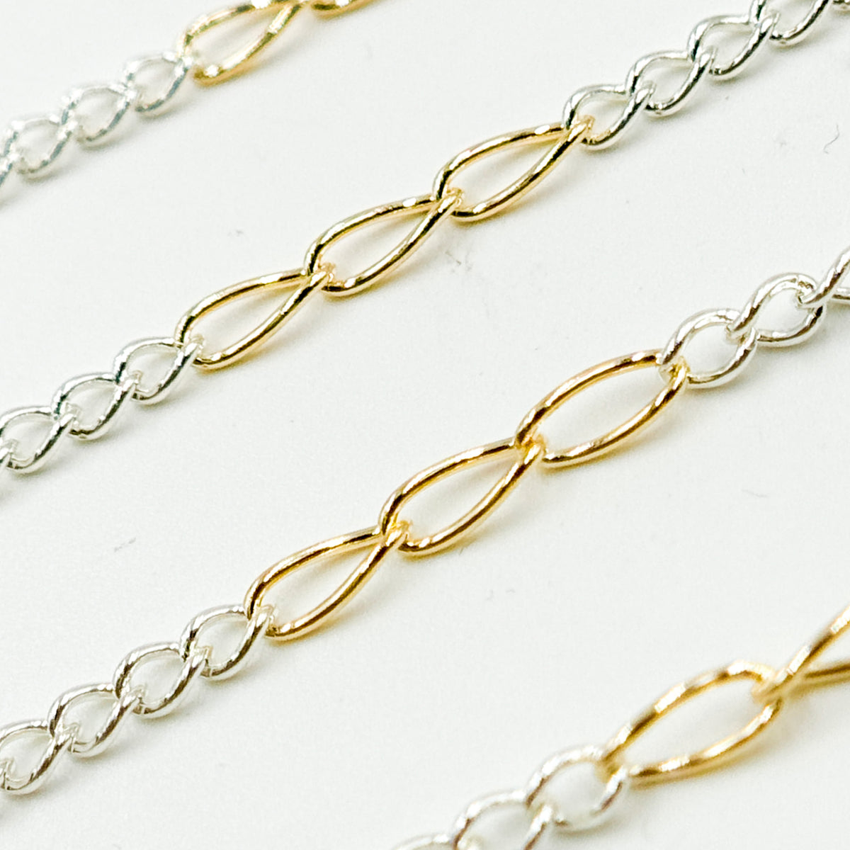 2453CTT. Gold Filled and Sterling Silver Long and Short Link Chain