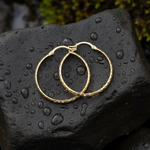 Load image into Gallery viewer, GER64. 14K Gold Diamond Cut Hollow Hoop Earrings