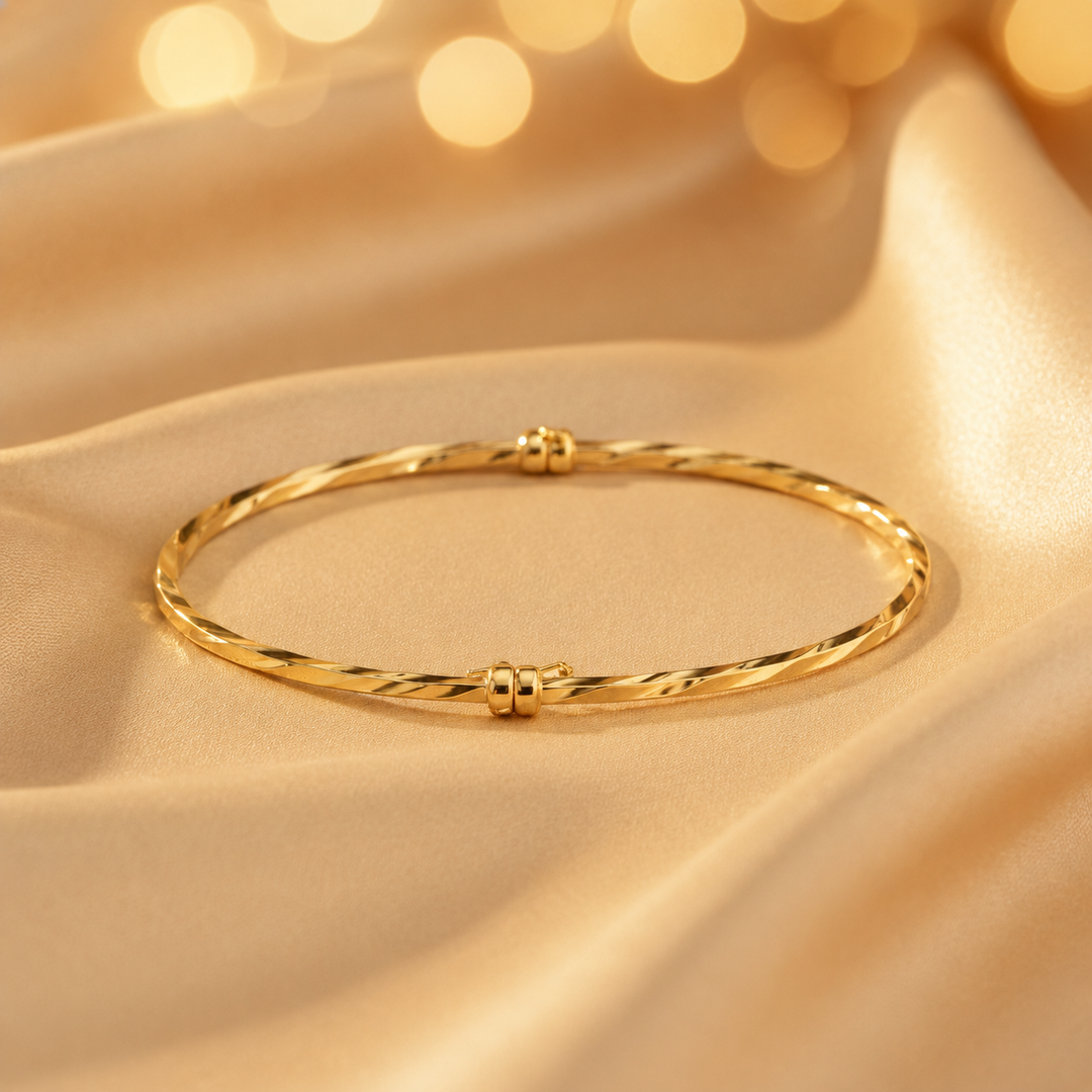 Bangle6. 14K Gold Twisted Hollow Bangle Bracelet