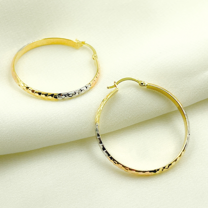 14K Gold Tri-Color Hoop Earrings with Engraved Tornado Design. 
