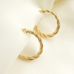 Load image into Gallery viewer, 14K Solid Gold Twisted Hoop Earrings. 