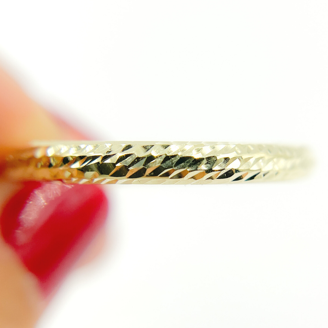 14K Gold Hoop Earrings with Engraved Tornado Design. 