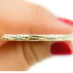 Load image into Gallery viewer, 14K Gold Hoop Earrings with Engraved Tornado Design.