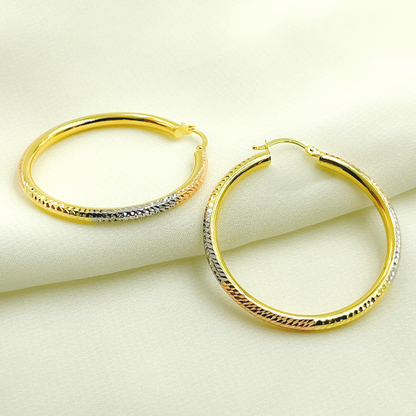 14K Gold Tri-Color Hoop Earrings with Engraved Tornado Design.