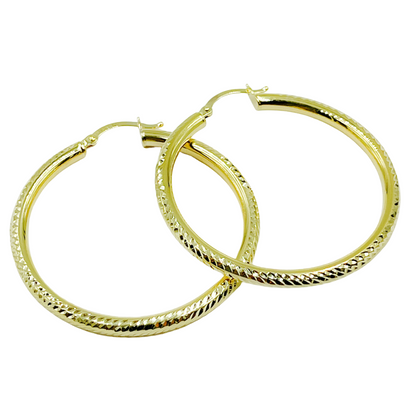 14K Gold Hoop Earrings with Engraved Tornado Design. 