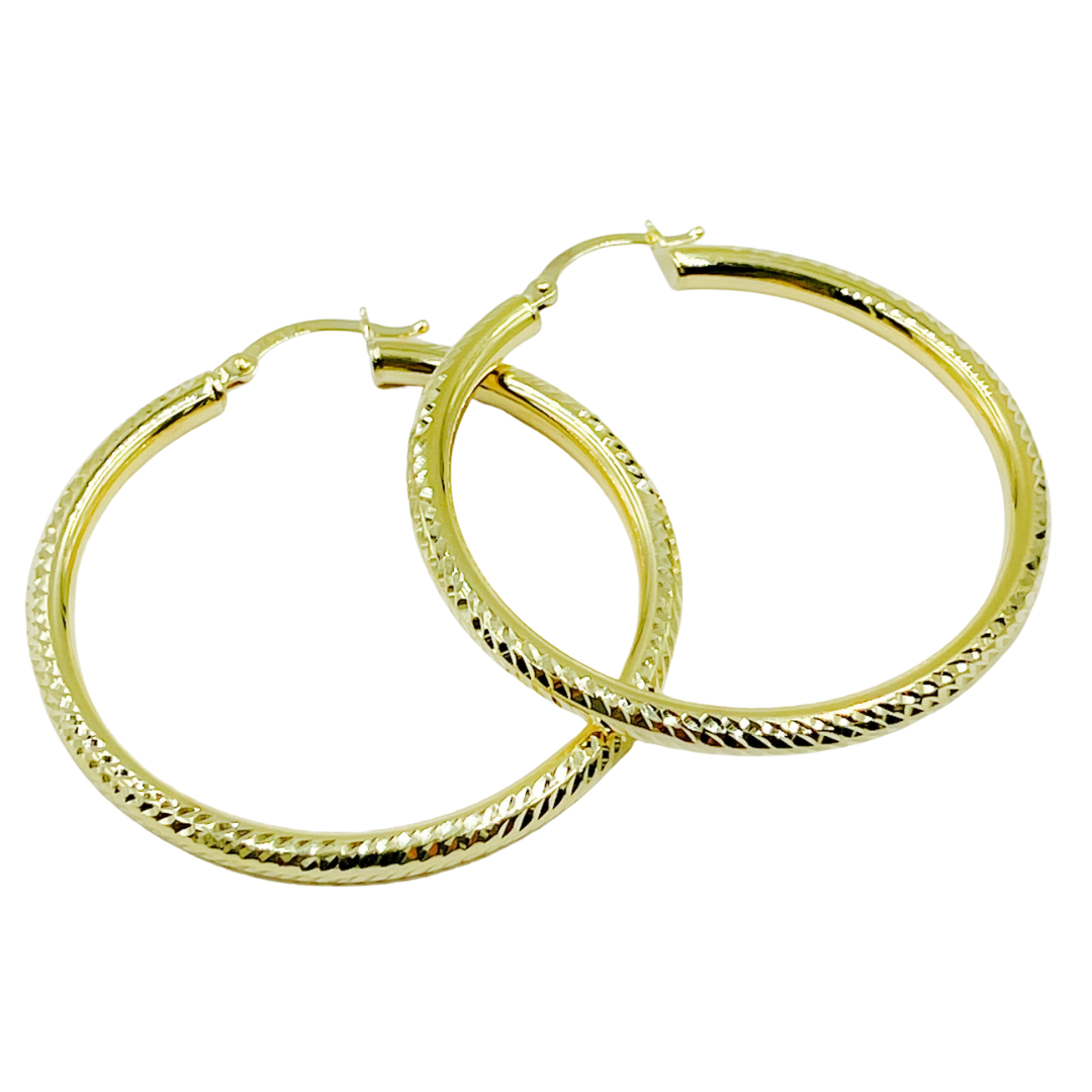 14K Gold Hoop Earrings with Engraved Tornado Design. 