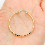 Load image into Gallery viewer, 14K Gold Diamond Cut Hoop Earrings.
