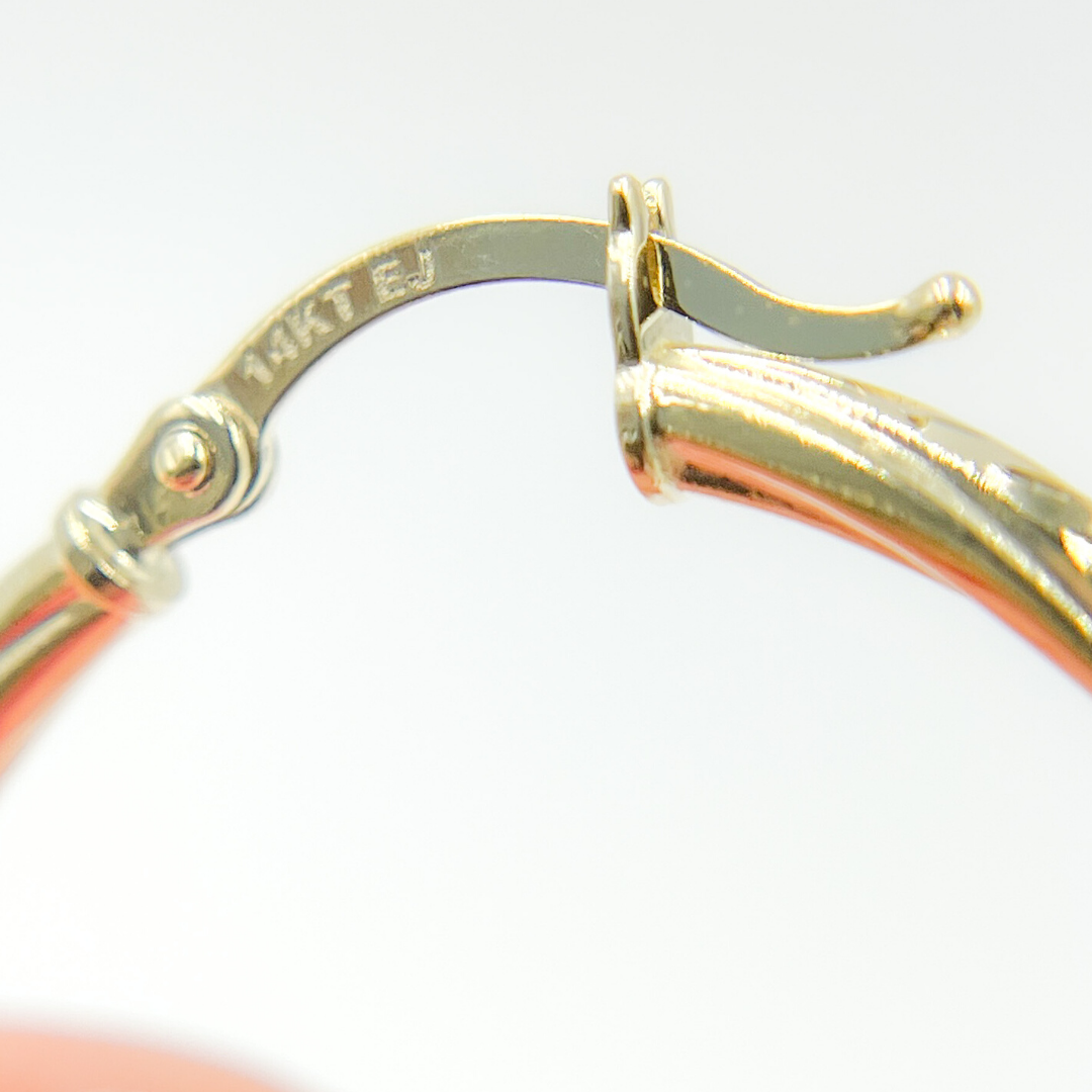 14K Gold Hoop Earrings with Engraved Tornado Design.