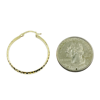 14K Gold Diamond Cut Hoop Earrings. 