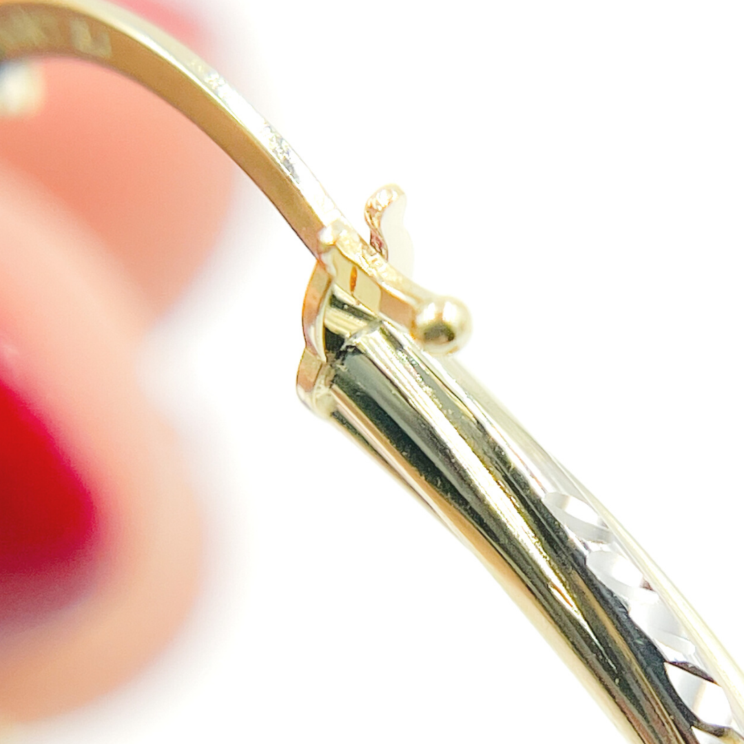 14K Gold Hoop Earrings with Engraved Tornado Design.