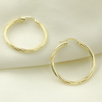 Load image into Gallery viewer, 14K Gold Hoop Earrings with Engraved Tornado Design.